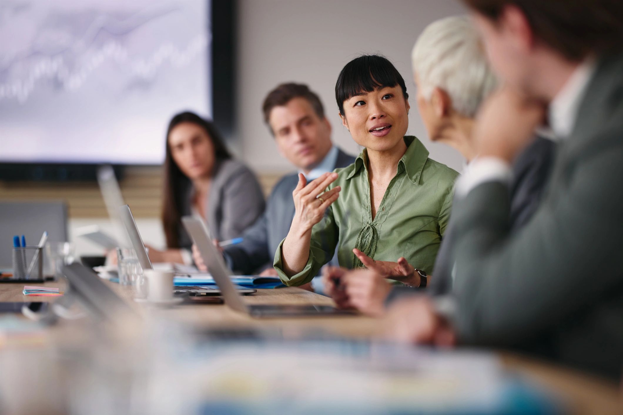 Digital strategist in conversation with a colleague